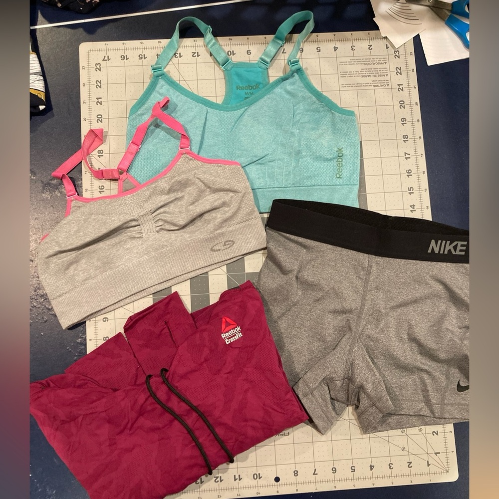 Athletic bundle 2 bras , 1 Reebok pullover 1 shorts